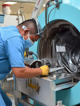 Service technician repairing an MRI machine at a hospital